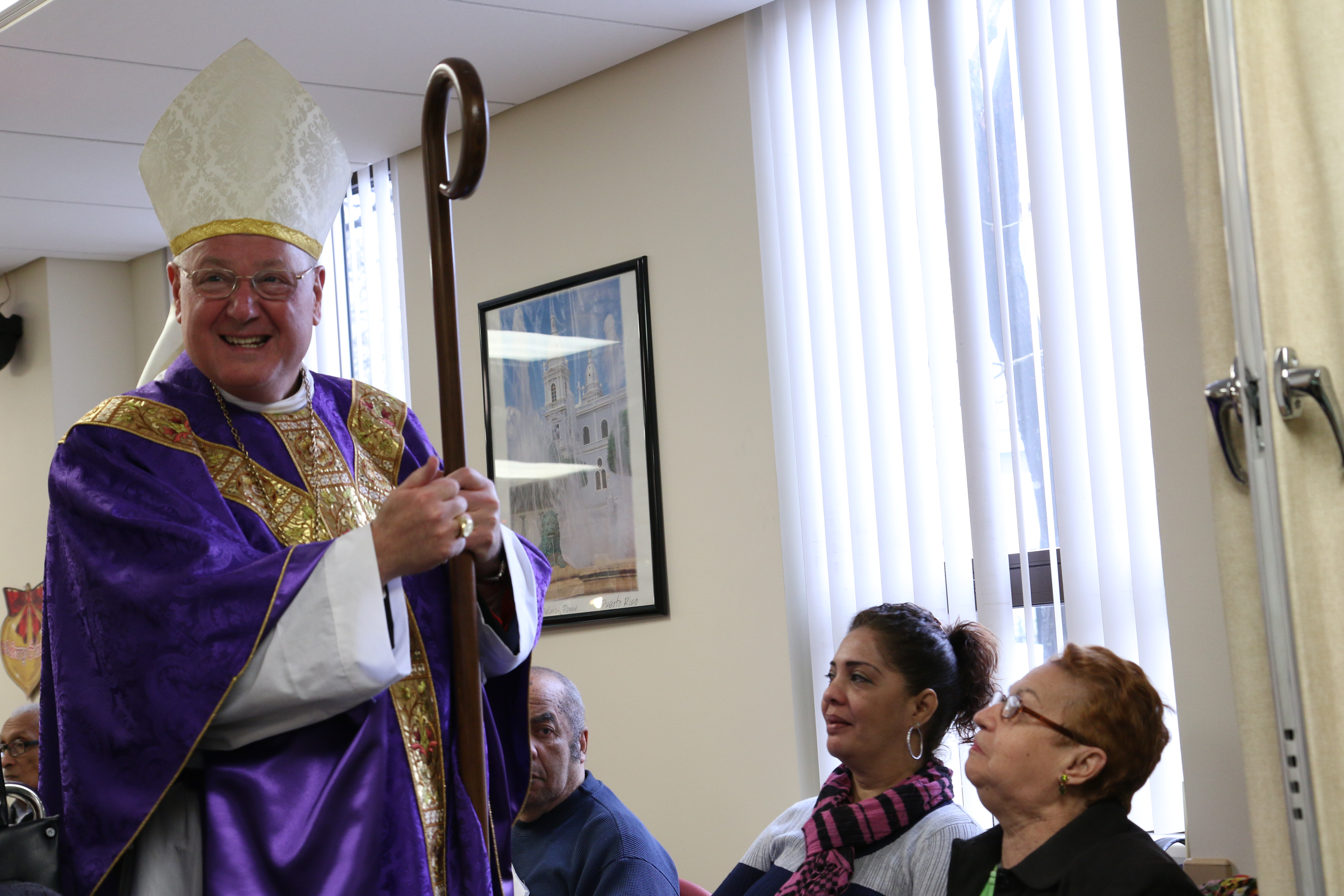 Cardinal visits Sandy survivors in Longwood