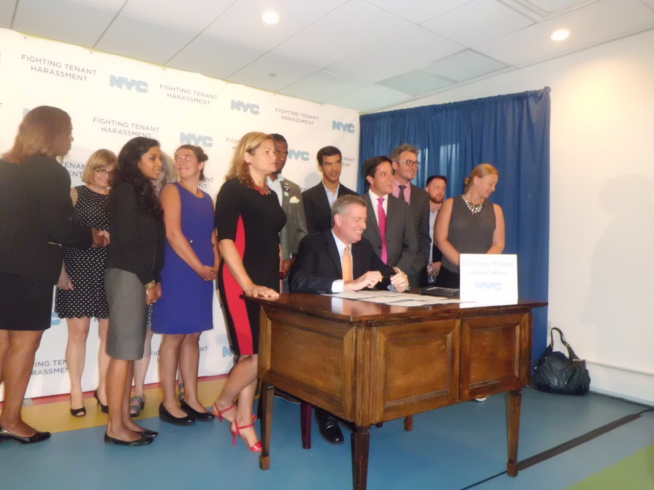 Mayor touts new laws protecting tenants