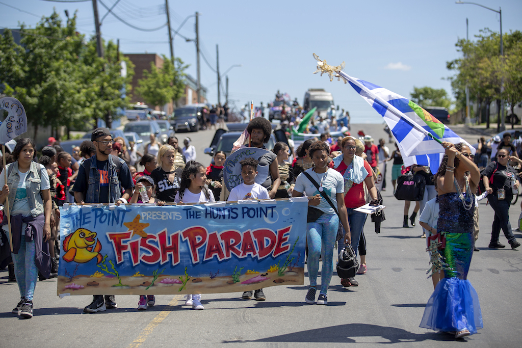 Fish Parade marchers salute Puerto Rico storm survivors